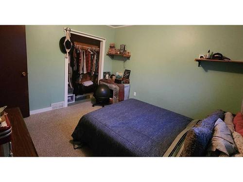 7010 17 Avenue, Coleman, AB - Indoor Photo Showing Bedroom