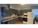 7010 17 Avenue, Coleman, AB  - Indoor Photo Showing Kitchen With Double Sink 