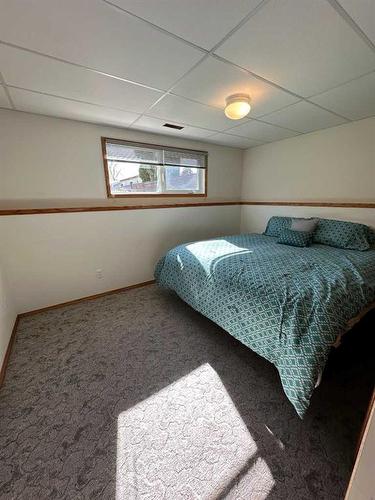 4810 58 Avenue, Taber, AB - Indoor Photo Showing Bedroom