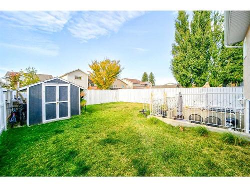 86 Assiniboia Way West, Lethbridge, AB - Outdoor With Backyard