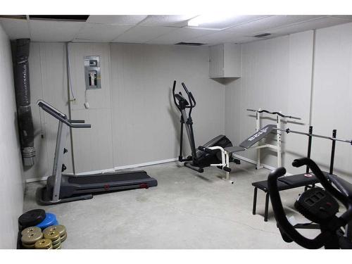 413 7 Street North, Picture Butte, AB - Indoor Photo Showing Gym Room