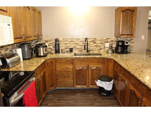 413 7 Street North, Picture Butte, AB - Indoor Photo Showing Kitchen With Double Sink