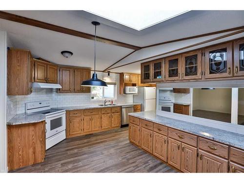 209 4 Avenue North, Champion, AB - Indoor Photo Showing Kitchen With Double Sink