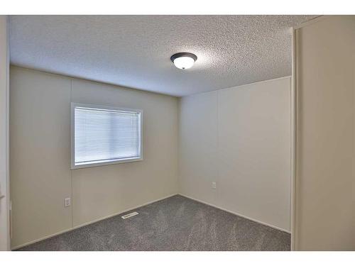 209 4 Avenue North, Champion, AB - Indoor Photo Showing Other Room