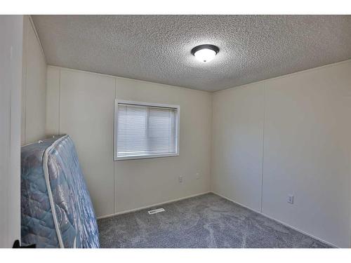 209 4 Avenue North, Champion, AB - Indoor Photo Showing Other Room