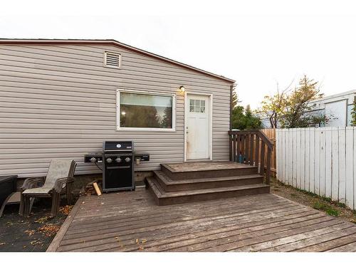 74 Dalhousie Court West, Lethbridge, AB - Outdoor With Deck Patio Veranda With Exterior