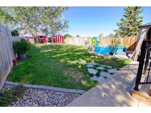 213 Mt Crandell Crescent West, Lethbridge, AB - Outdoor With Backyard