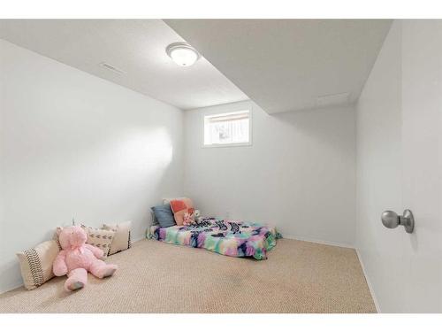 5008 4 Street, Coalhurst, AB - Indoor Photo Showing Bedroom