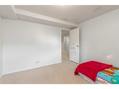 5008 4 Street, Coalhurst, AB - Indoor Photo Showing Bedroom