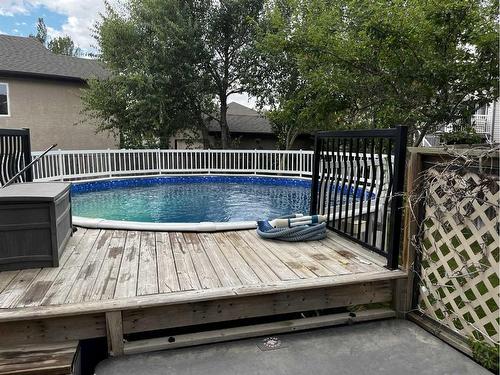 10 Squamish Bay West, Lethbridge, AB - Outdoor With Above Ground Pool