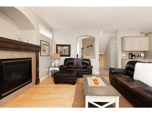 10 Squamish Bay West, Lethbridge, AB - Indoor Photo Showing Living Room With Fireplace