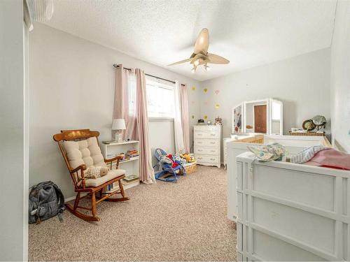 612 Mcdougall Street, Pincher Creek, AB - Indoor Photo Showing Bedroom