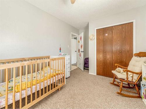 612 Mcdougall Street, Pincher Creek, AB - Indoor Photo Showing Bedroom