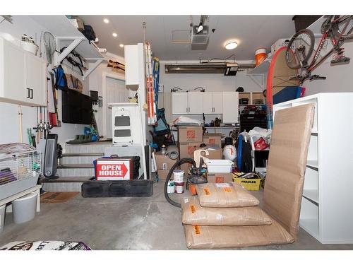 100 Blackfoot Circle West, Lethbridge, AB - Indoor Photo Showing Garage