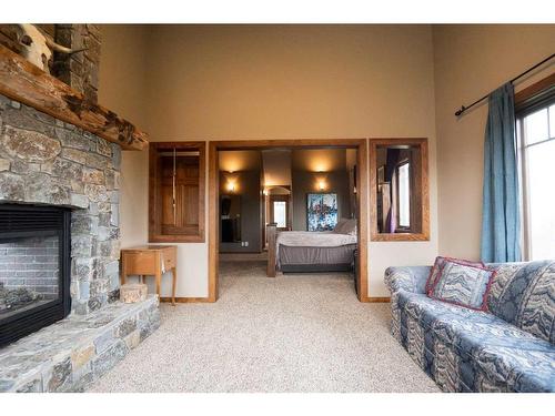 195041 Highway 512, Rural Lethbridge County, AB - Indoor Photo Showing Living Room With Fireplace