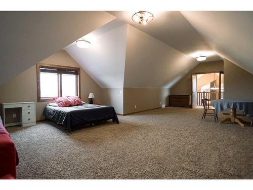 195041 Highway 512, Rural Lethbridge County, AB - Indoor Photo Showing Bedroom