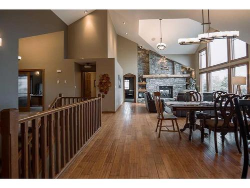 195041 Highway 512, Rural Lethbridge County, AB - Indoor Photo Showing Dining Room With Fireplace