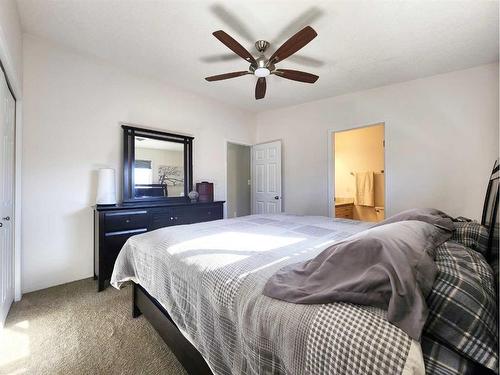 65 Squamish Crescent West, Lethbridge, AB - Indoor Photo Showing Bedroom