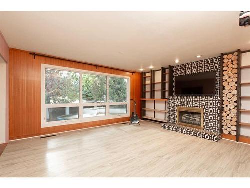 2818 6A Avenue South, Lethbridge, AB - Indoor Photo Showing Living Room With Fireplace