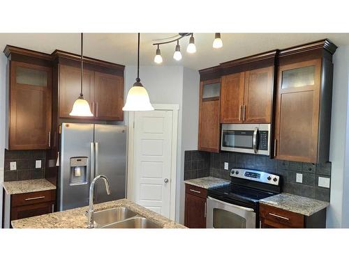 2236 18 Avenue, Coaldale, AB - Indoor Photo Showing Kitchen With Stainless Steel Kitchen With Double Sink With Upgraded Kitchen