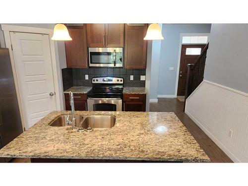 2236 18 Avenue, Coaldale, AB - Indoor Photo Showing Kitchen With Stainless Steel Kitchen With Double Sink With Upgraded Kitchen