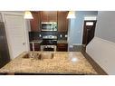 2236 18 Avenue, Coaldale, AB  - Indoor Photo Showing Kitchen With Stainless Steel Kitchen With Double Sink With Upgraded Kitchen 