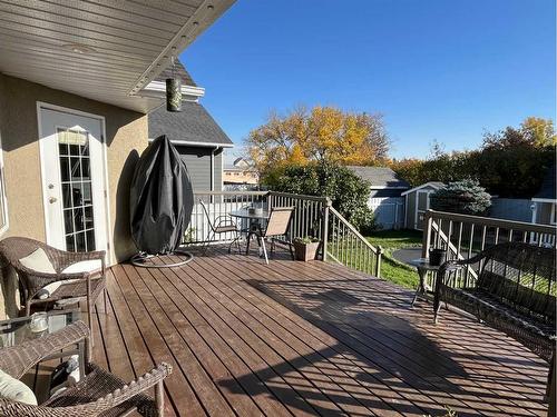 242W 100S, Raymond, AB - Outdoor With Deck Patio Veranda With Exterior