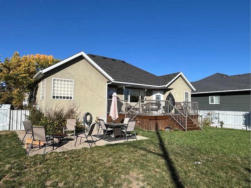 242W 100S, Raymond, AB - Outdoor With Deck Patio Veranda