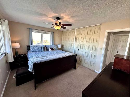 210 4 Street East, Cardston, AB - Indoor Photo Showing Bedroom