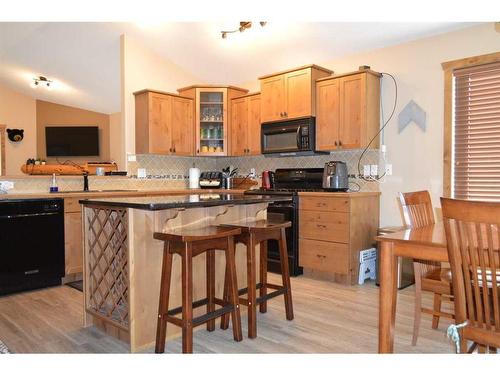 401 Castle Mountain Way, Rural Pincher Creek No. 9, M.D. Of, AB - Indoor Photo Showing Kitchen With Double Sink