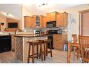 401 Castle Mountain Way, Rural Pincher Creek No. 9, M.D. Of, AB  - Indoor Photo Showing Kitchen With Double Sink 