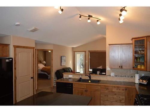 401 Castle Mountain Way, Rural Pincher Creek No. 9, M.D. Of, AB - Indoor Photo Showing Kitchen With Double Sink