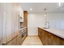 515-102 Scenic Drive North, Lethbridge, AB  - Indoor Photo Showing Kitchen With Double Sink With Upgraded Kitchen 