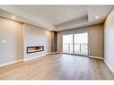 318-102 Scenic Drive North, Lethbridge, AB  - Indoor With Fireplace 