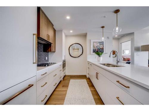 327-102 Scenic Drive North, Lethbridge, AB - Indoor Photo Showing Kitchen With Double Sink