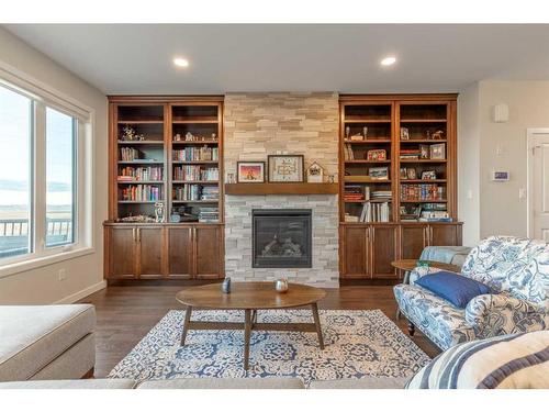 248 Agnes Short Place North, Lethbridge, AB - Indoor Photo Showing Living Room With Fireplace