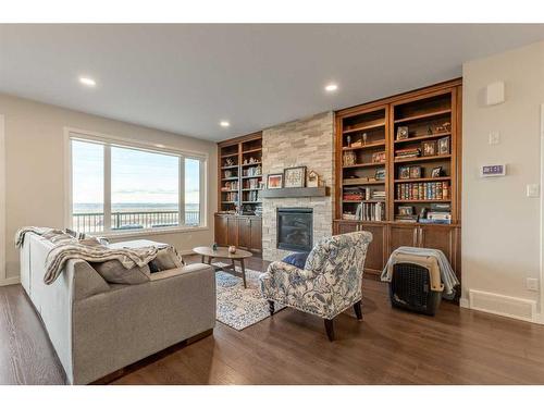 248 Agnes Short Place North, Lethbridge, AB - Indoor Photo Showing Living Room With Fireplace