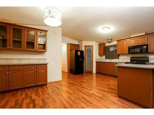 1716 18 Avenue, Coaldale, AB - Indoor Photo Showing Kitchen