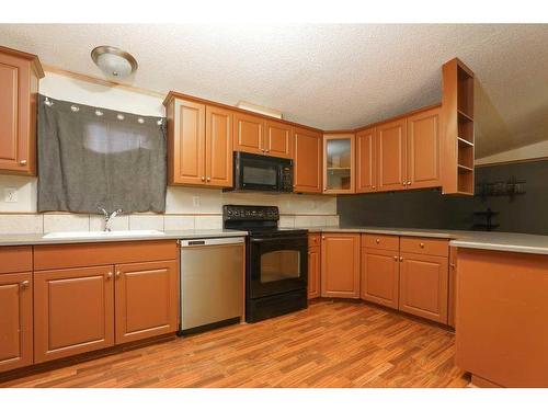 1716 18 Avenue, Coaldale, AB - Indoor Photo Showing Kitchen