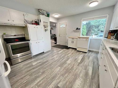 2420 14 Avenue South, Lethbridge, AB - Indoor Photo Showing Kitchen With Double Sink