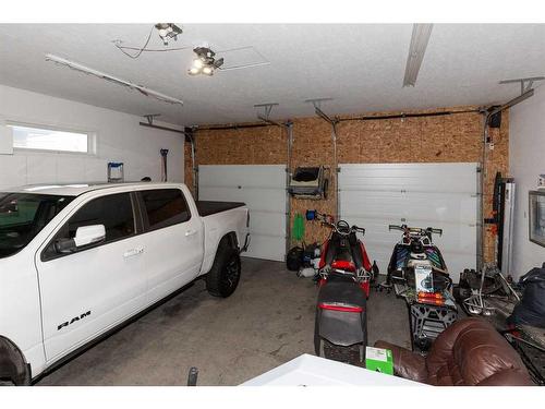 87 Jessie Robinson Close North, Lethbridge, AB - Indoor Photo Showing Garage