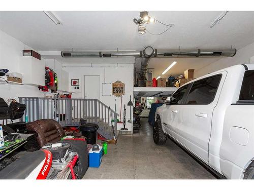 87 Jessie Robinson Close North, Lethbridge, AB - Indoor Photo Showing Garage