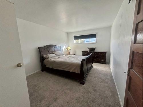 6730 17Th Avenue, Coleman, AB - Indoor Photo Showing Bedroom