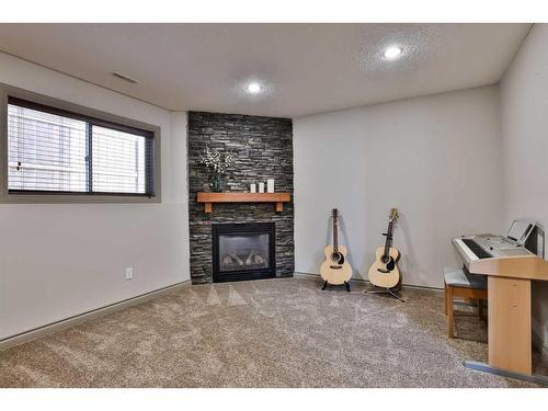 5205 44A Street, Taber, AB - Indoor With Fireplace