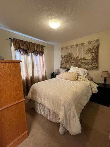 34 Fairway Village, Taber, AB - Indoor Photo Showing Bedroom