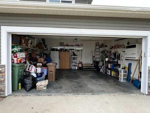 34 Fairway Village, Taber, AB - Indoor Photo Showing Garage