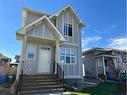 334 Mt Sundance Landing West, Lethbridge, AB  - Outdoor With Facade 