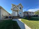 334 Mt Sundance Landing West, Lethbridge, AB  - Outdoor With Facade 