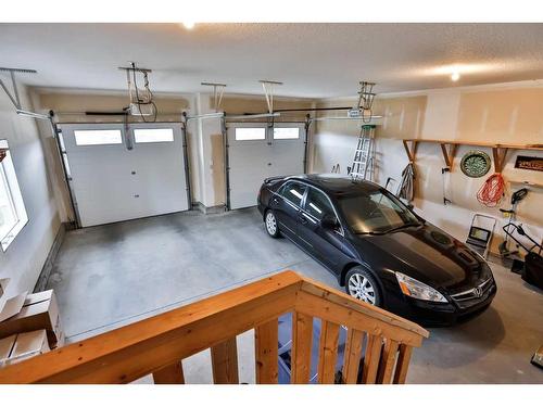 332 Stonecrest Place West, Lethbridge, AB - Indoor Photo Showing Garage