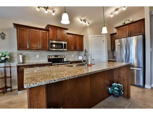 332 Stonecrest Place West, Lethbridge, AB - Indoor Photo Showing Kitchen With Double Sink With Upgraded Kitchen